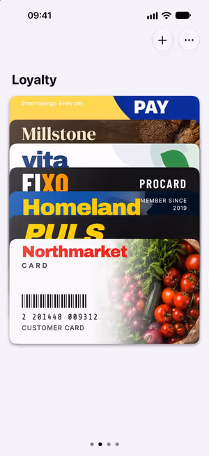 WalletCard on iPhone: a stack of loyalty cards, a card with a barcode in front.